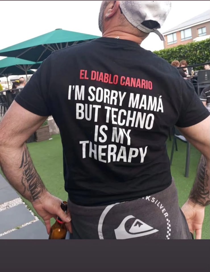 Customer wearing an El Diablo Canario tank top