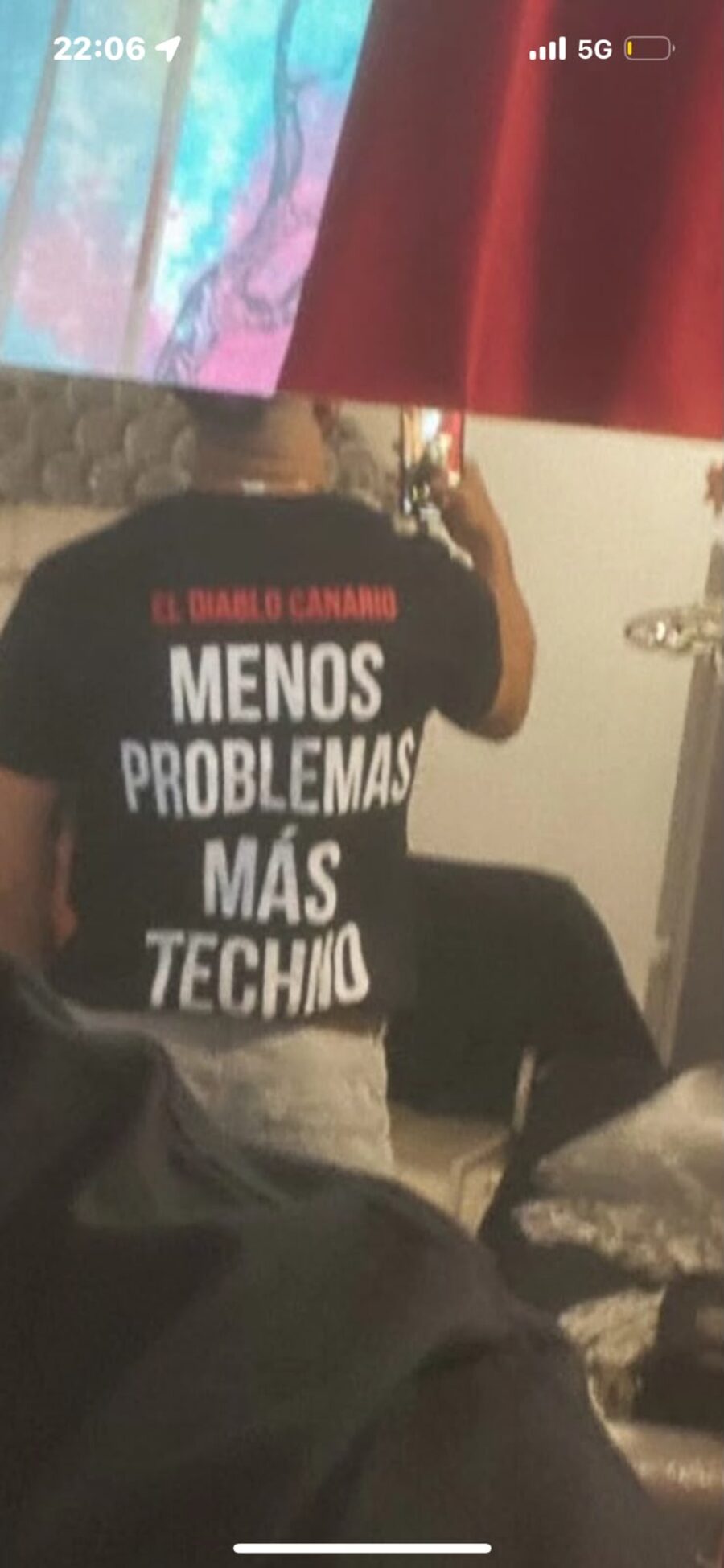 Raver in El Diablo Canario apparel in the crowd